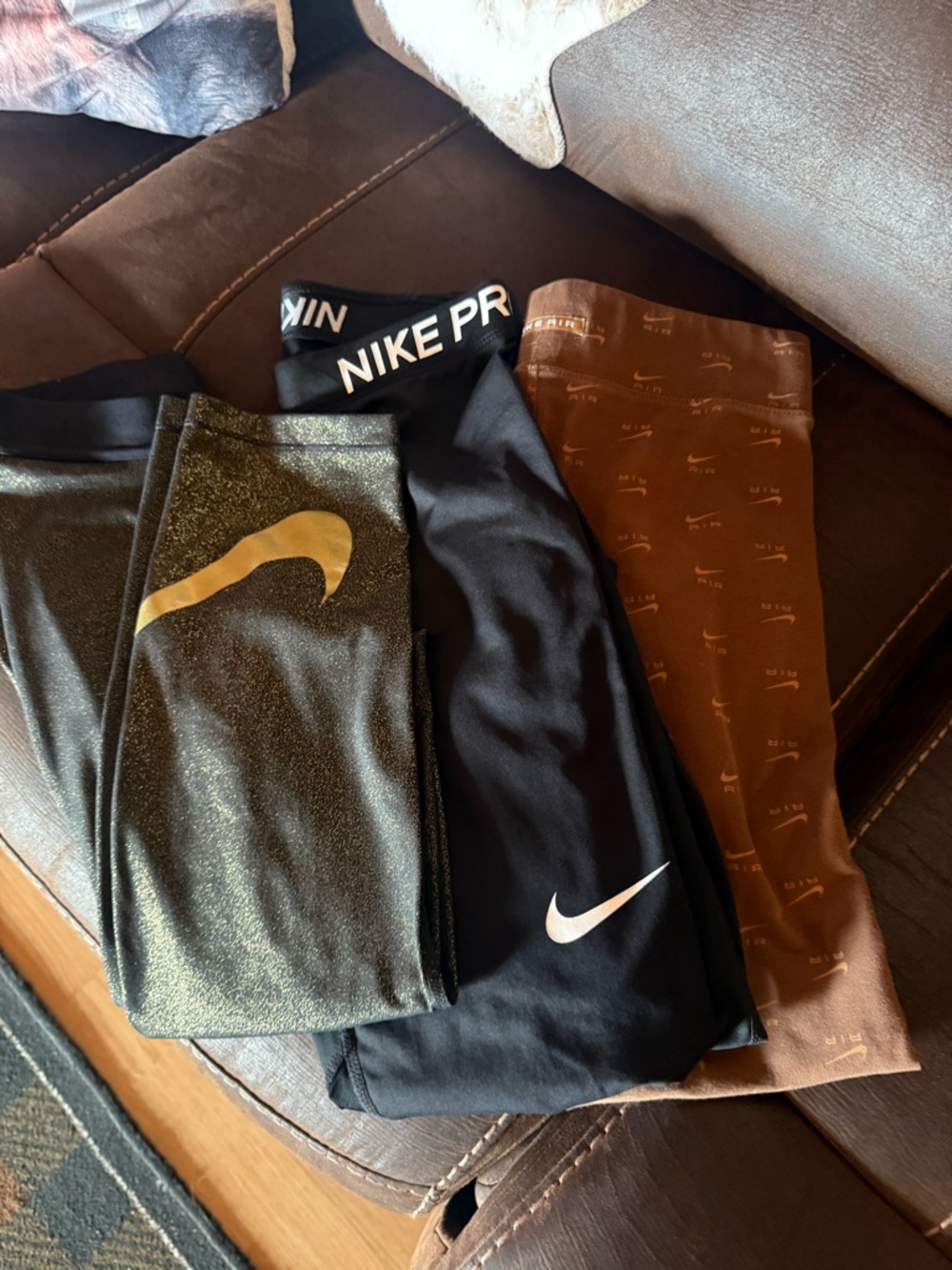 Nike women' Leggings in Black, Gold, Brown